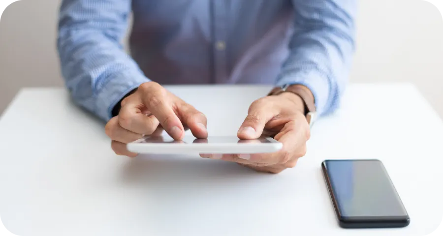 Hands with tablet