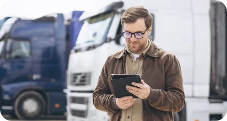 Man near vehicles